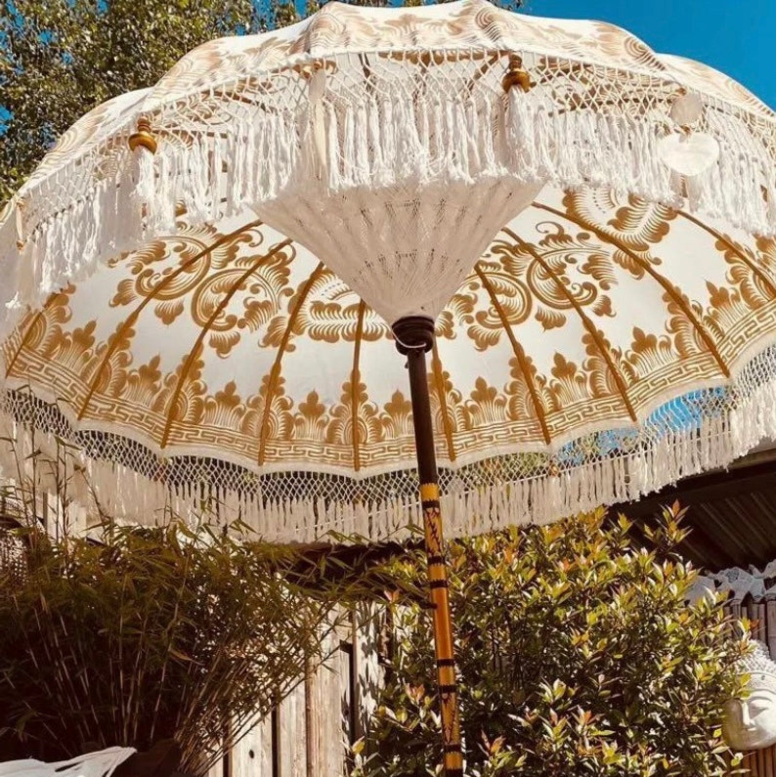 gold patio umbrella Golden Abbey Balinese Parasol