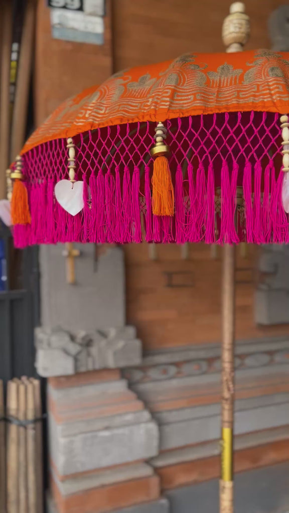 Artisan craftsmanship visible in the intricate threadwork inside the Clementine Parasol.