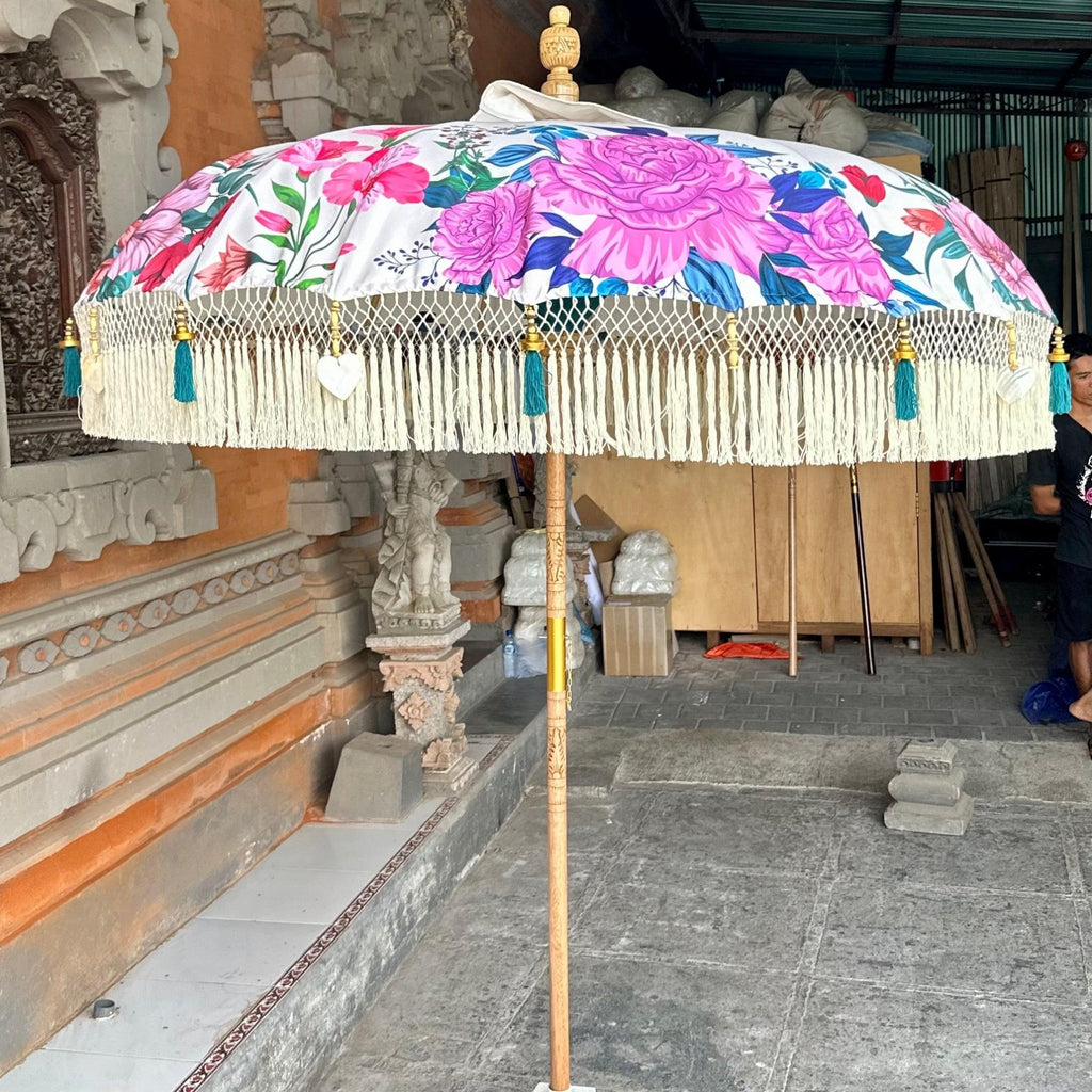 Artistic shot of the Daisy Parasol canopy emphasizing the vivid floral design against the crisp white background.