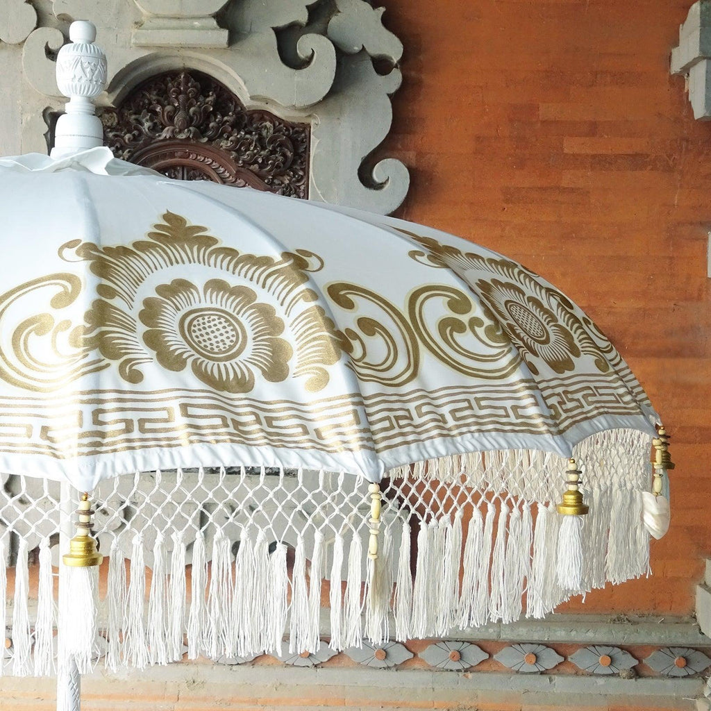 Detailed gold artwork on the Ally Parasol, blending luxury design with artisanal craftsmanship
